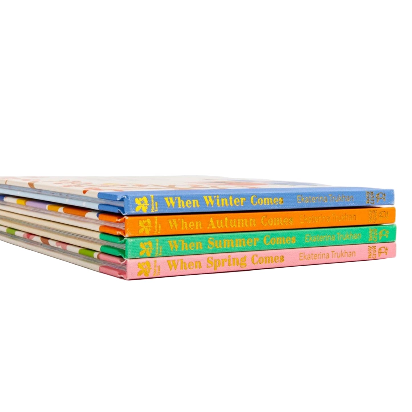 Stack of children's books titled 'When Winter Comes' to 'When Spring Comes' on a white background
