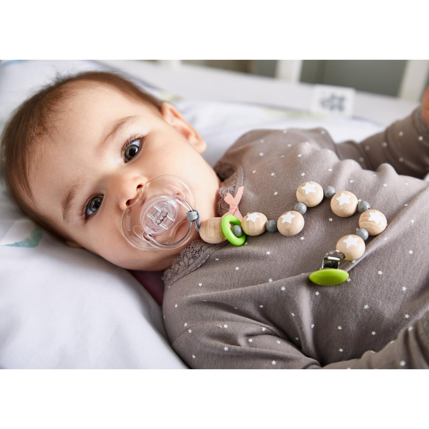 HABA Little Stars Wooden Dummy Clip | Lifestyle – Baby with Dummy Clip | BeoVERDE.ie