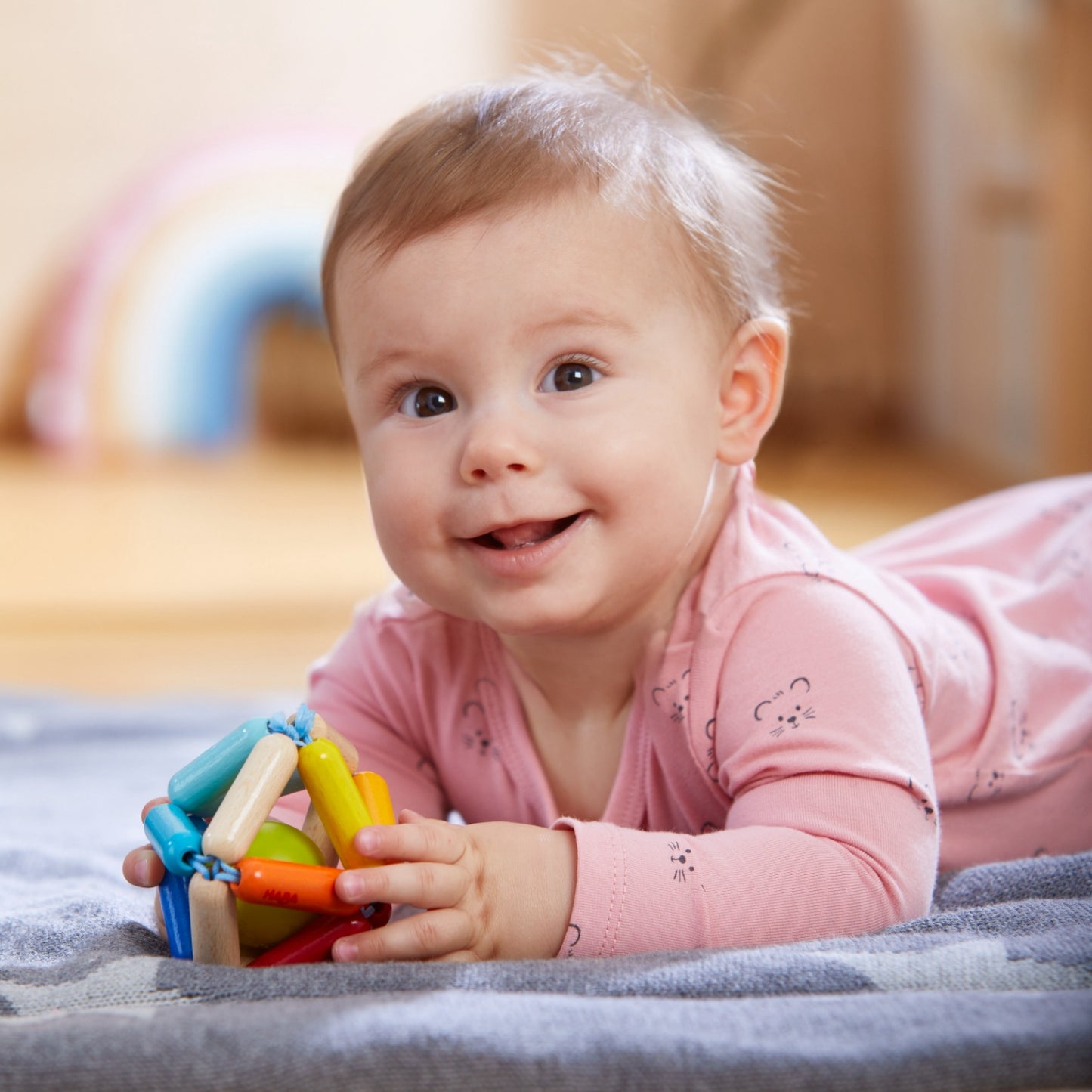 Octavi | Rattle & Clutching Toy | Baby’s First Wooden Toy | HABA | Lifestyle: Baby with Clutching Toy | BeoVERDE.ie