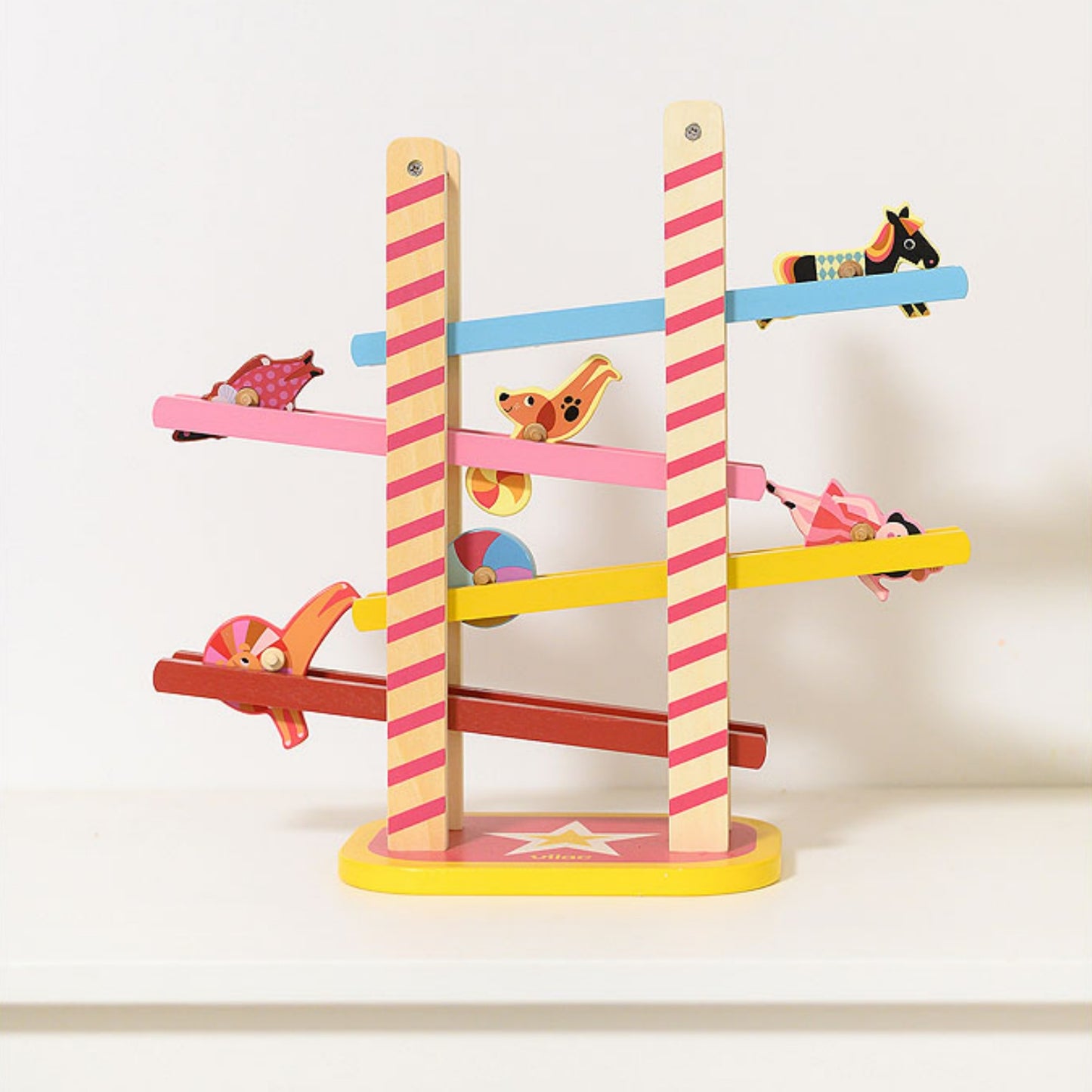 Vilac Acrobat's Cascade designed by Ingela P.Arrhenius | Wooden Toddler Activity Toy | Lifestyle - Side View - Figures Rolling | BeoVERDE.ie