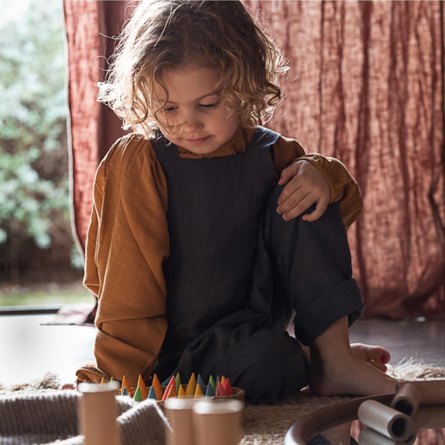 Grapat Baby Sticks | Wooden Toys for Kids | Open-Ended Play Set | Lifestyle: Girl Playing Grapat Baby Sticks and Tubes on the Ground | BeoVERDE.ie