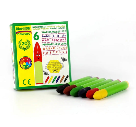 Box of okoNORM Navaro wax crayons with colourful crayons displayed in front on a white background