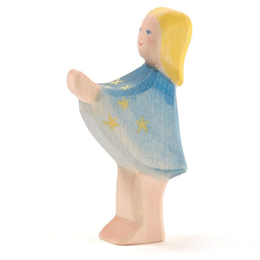 Ostheimer Startaler wooden doll with blue dress and yellow stars on a white background