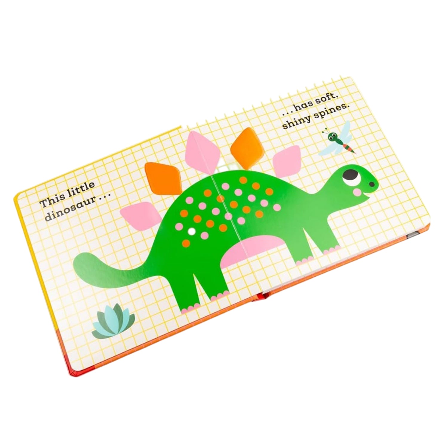 Children's book with a green dinosaur illustration on a white background