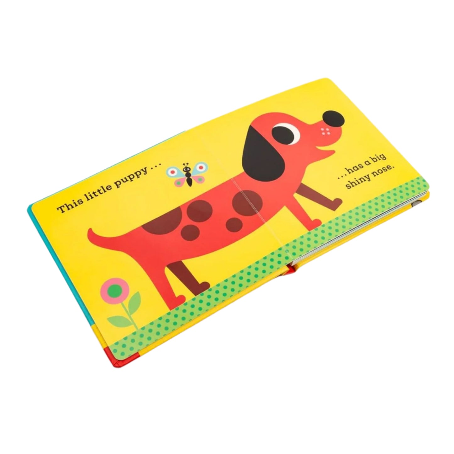 Children's book with a colorful illustration of a dog on a yellow background