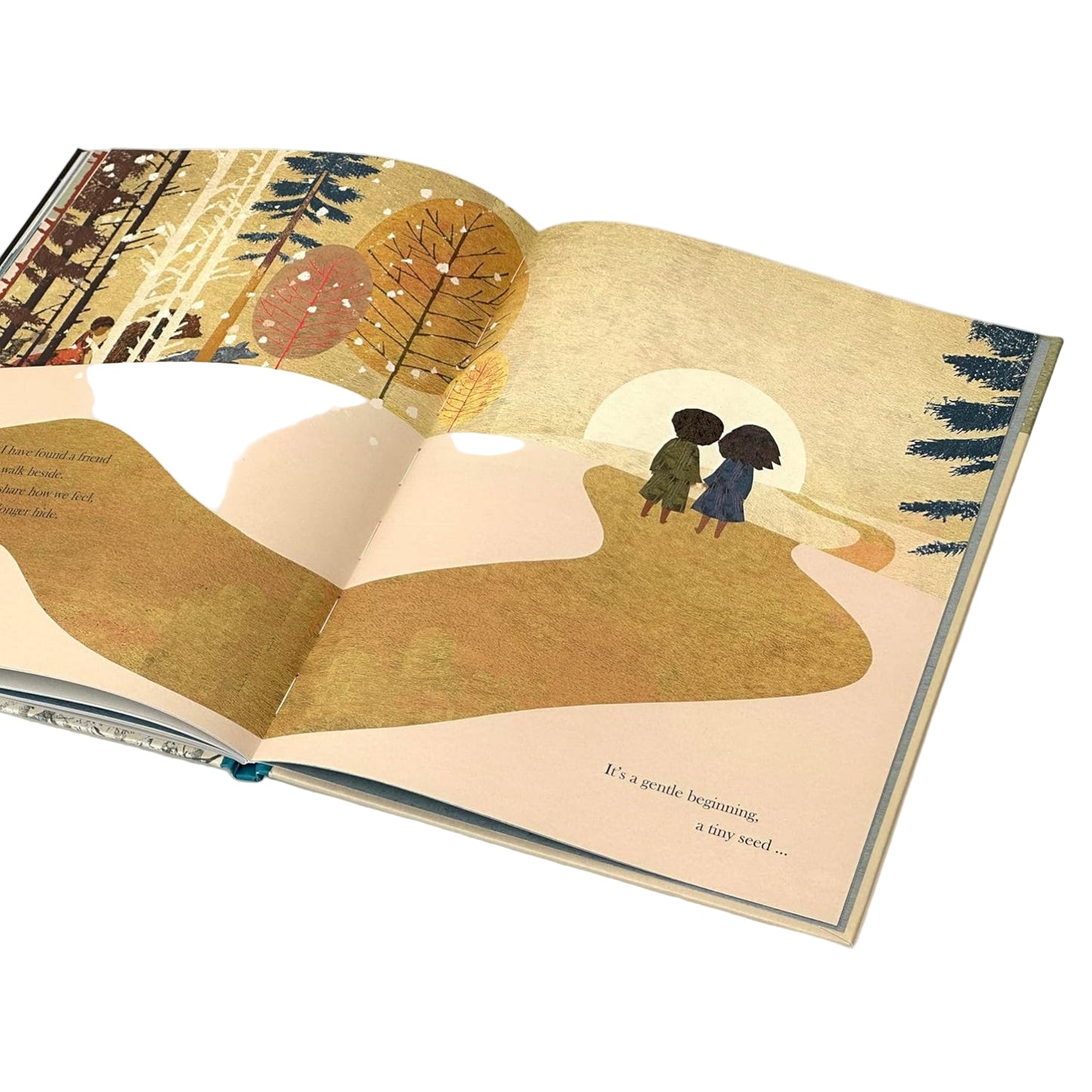 Open book with illustrated pages showing two people walking together in a scenic setting.
