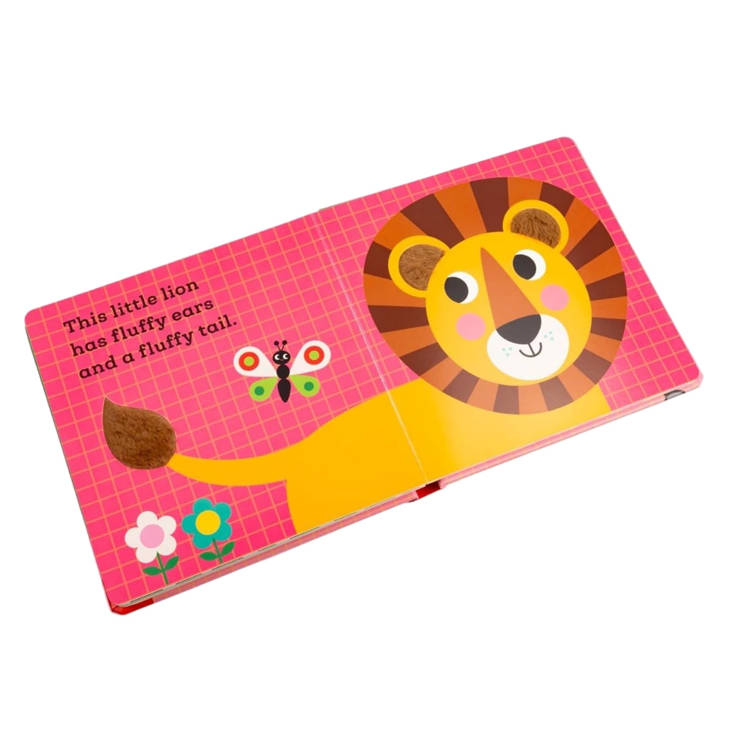 Children's book with a lion illustration on a pink background