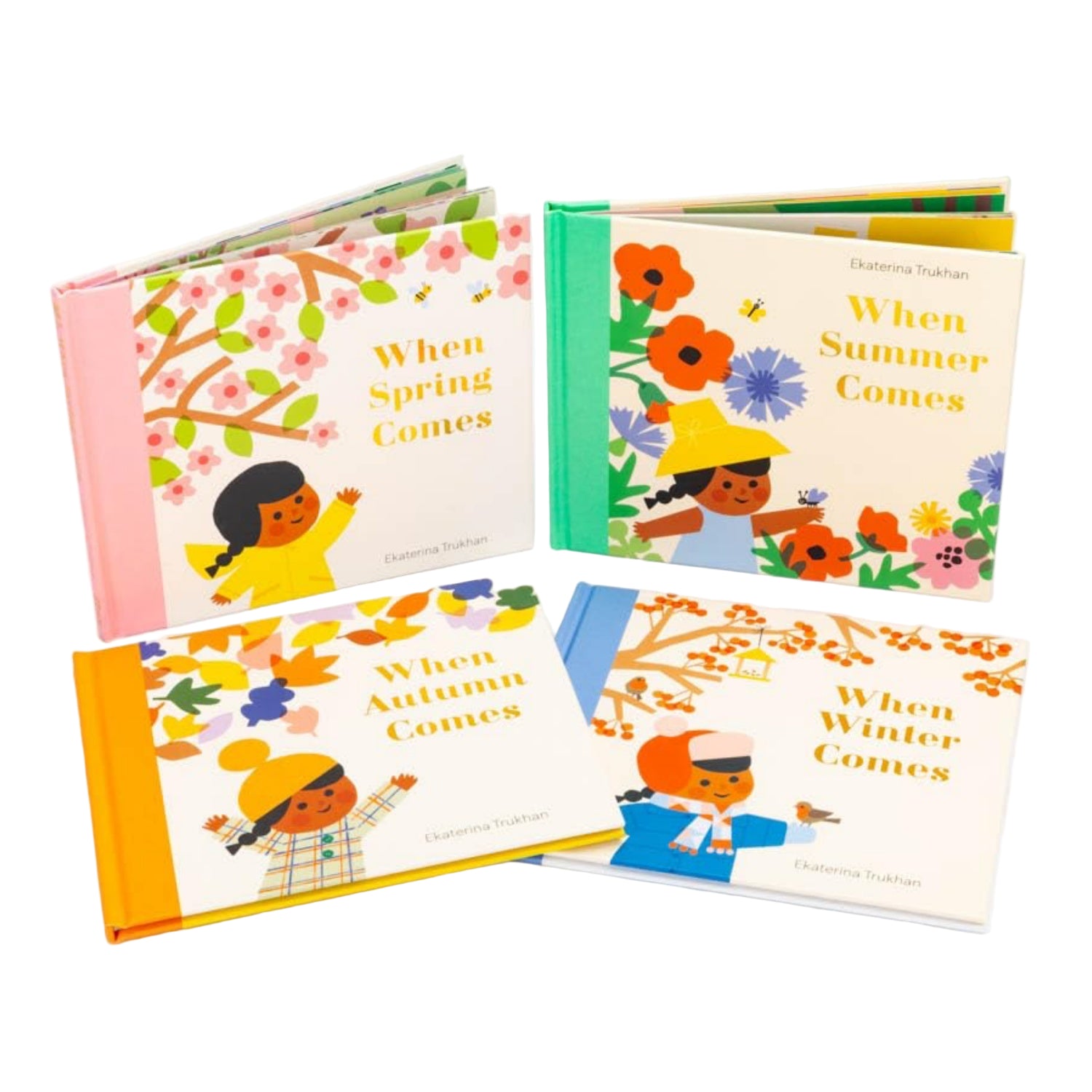 Set of four children's books titled 'When Spring Comes', 'When Summer Comes', 'When Autumn Comes', and 'When Winter Comes' on a white background.