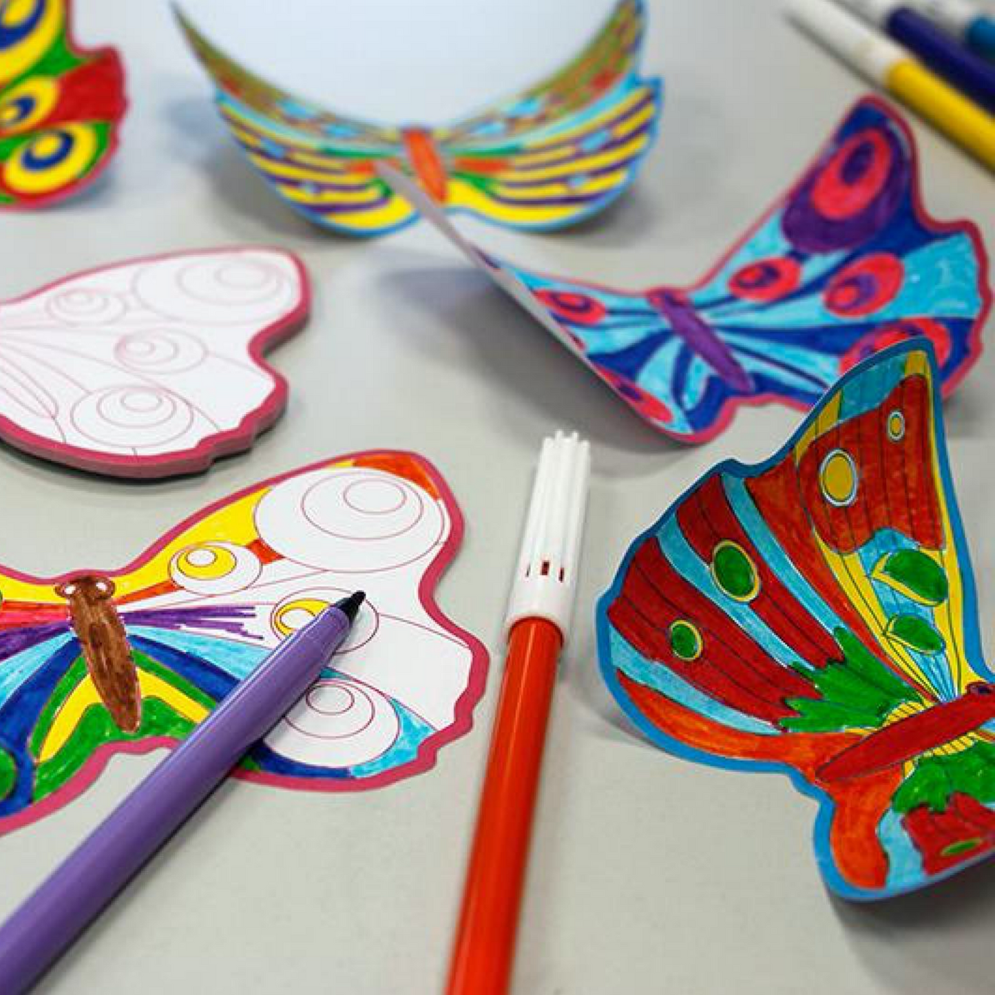 Self-Stick Colouring Butterflies | Butterflies with Red Outline on Table | BEOVERDE.ie