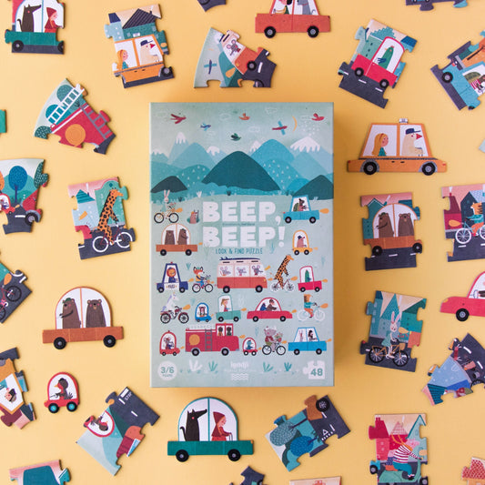 Londji BEEP BEEP! Jigsaw Puzzle | Designed by Txell Darne Jigsaw Puzzle and Game | Perfect Jigsaw Puzzle for Kids 3 Years and Older | Front View – Box with Jigsaw Puzzle Pieces Around | BeoVERDE.ie