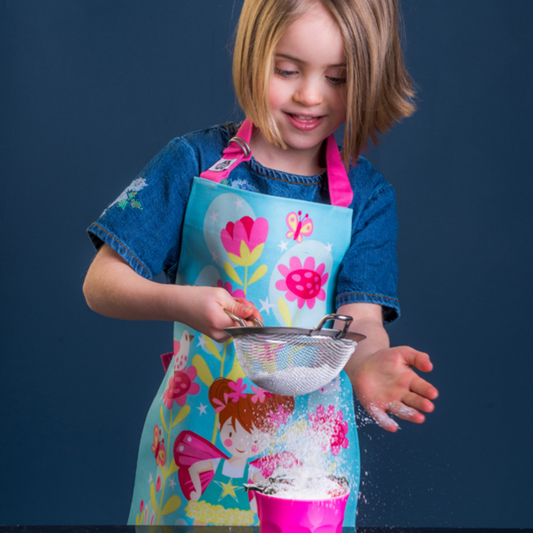 ThreadBear Design Children’s Apron ‘Trixie The Pixie’ | Girl Wearing Apron and Baking | BeoVERDE.ie