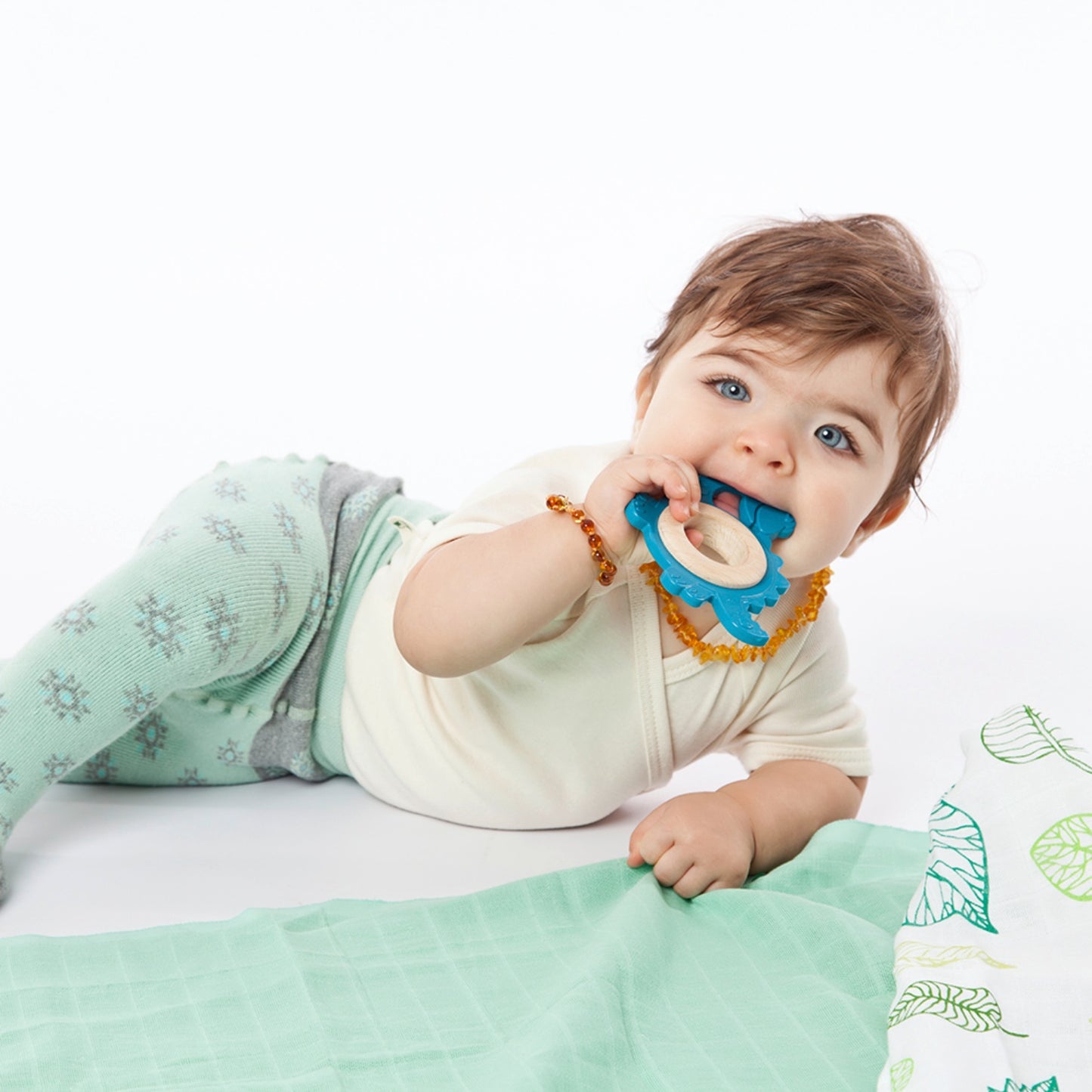 Grunspecht Dinosaur Organic Rubber and Beech Wood Baby Teether | Lifestyle: Baby with Teething Toy | BeoVERDE Ireland
