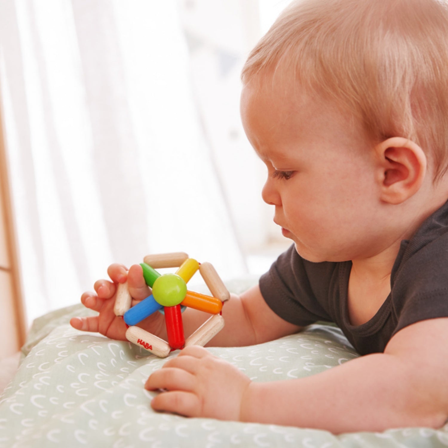 Colour Carousel | Clutching Toy | Baby’s First Wooden Toy | HABA | Lifestyle: Baby with Clutching Toy | BeoVERDE.ie