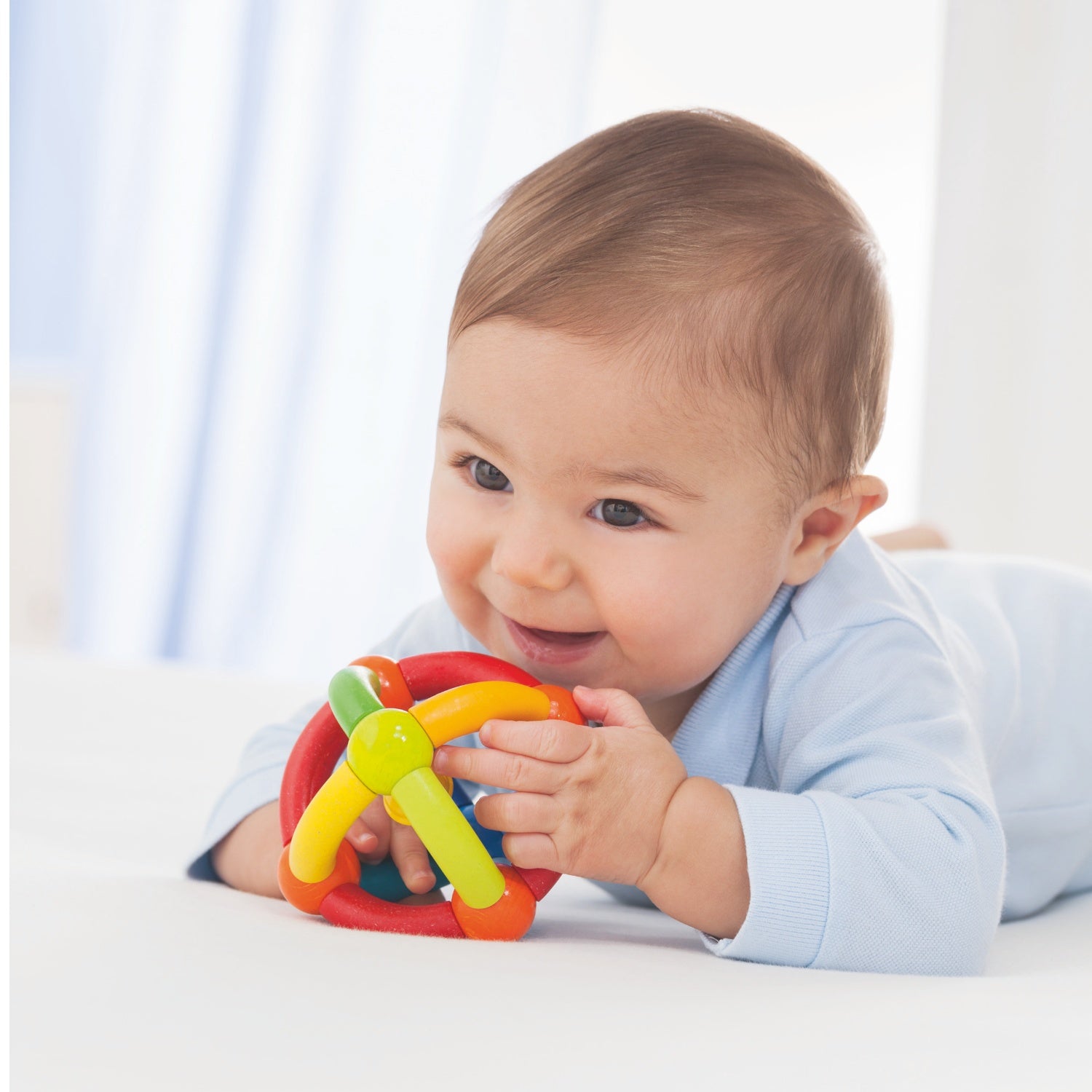 RingAround | Wooden Baby Clutching Toy | HABA | Lifestyle: Baby with Clutching Toy | BeoVERDE.ie