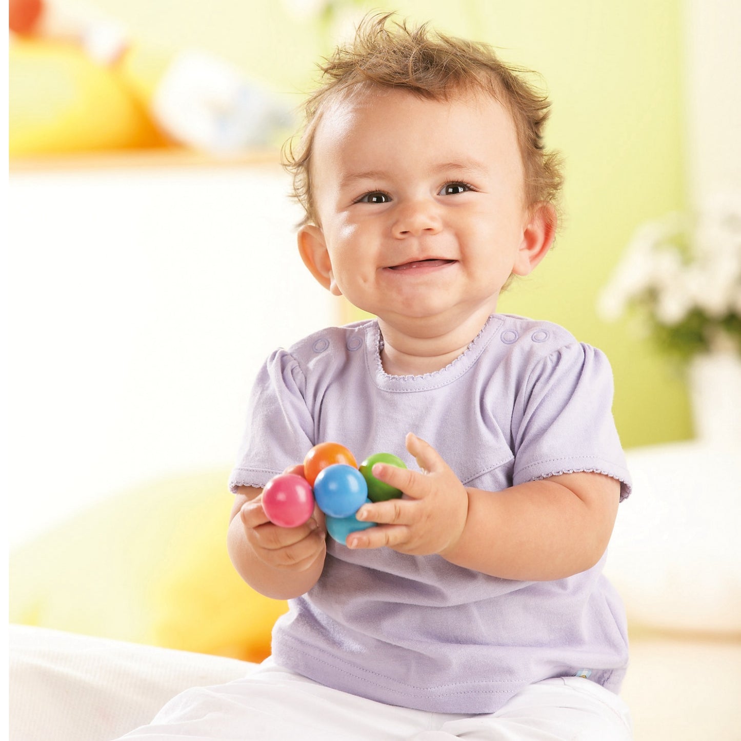 Magica | Wooden Rattle and Clutching Toy | HABA | Lifestyle: Baby with Clutching Toy | BeoVERDE.ie