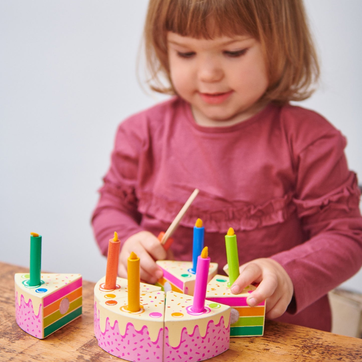 Tender Leaf Toys Rainbow Birthday Cake | Wooden Play Food & Kitchen Toys | Lifestyle – Girl Playing | BeoVERDE.ie