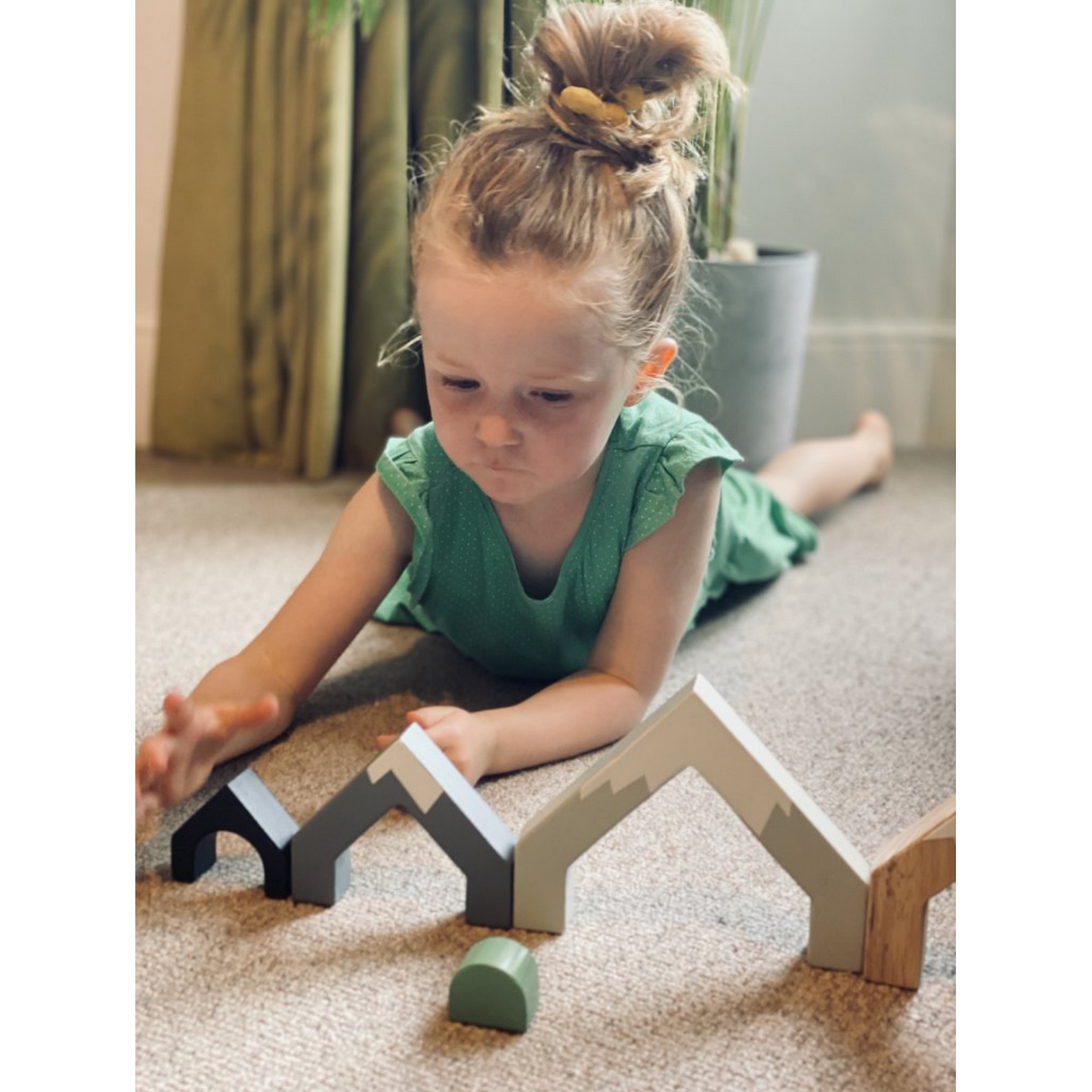 Tender Leaf Mountain Pass Stack Set | Hand-Crafted Wooden Animal Toys | Girl Playing with Mountain Pass Stack | BeoVERDE.ie