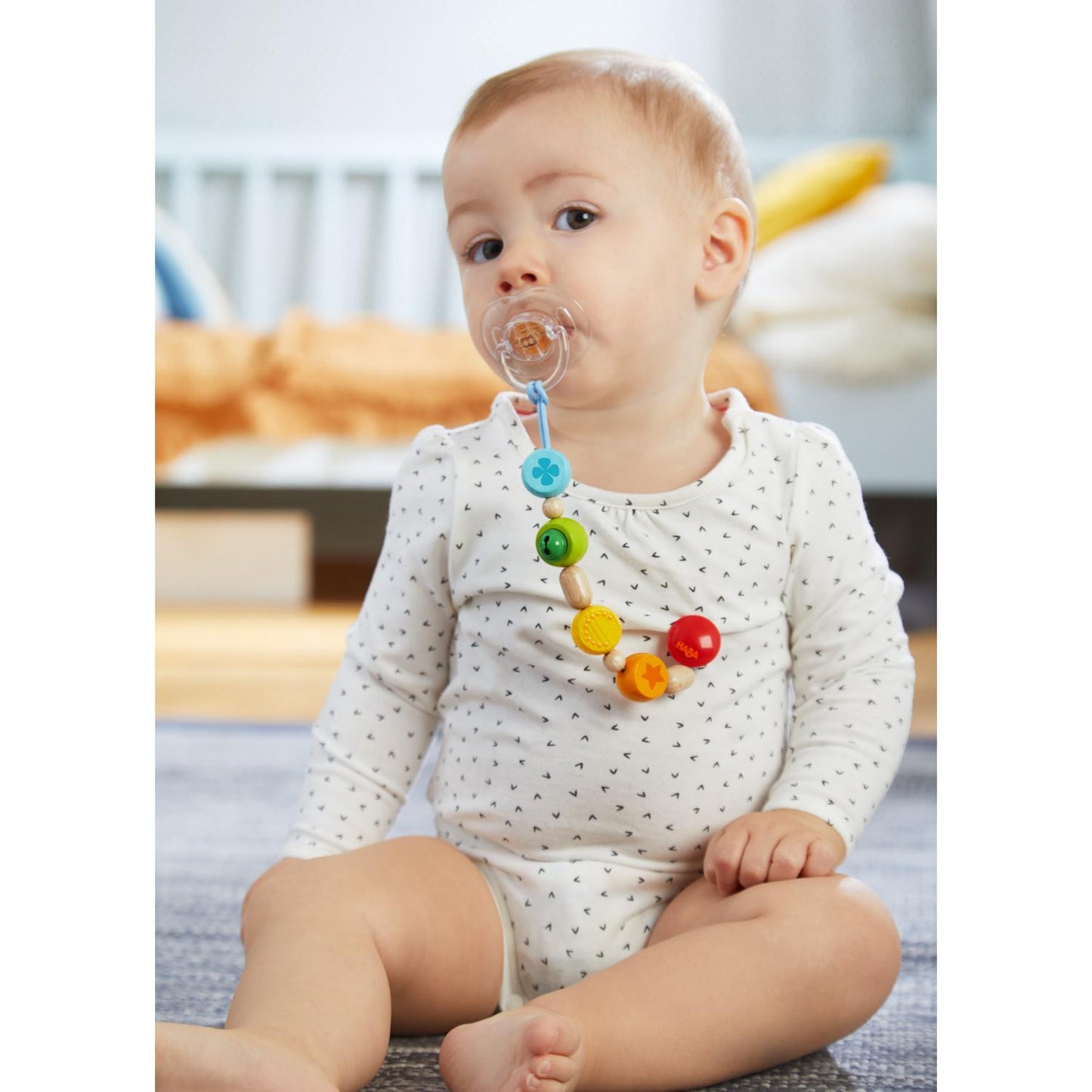 HABA Jingling Bell Wooden Dummy Clip | Lifestyle – Baby with Dummy Clip | BeoVERDE.ie