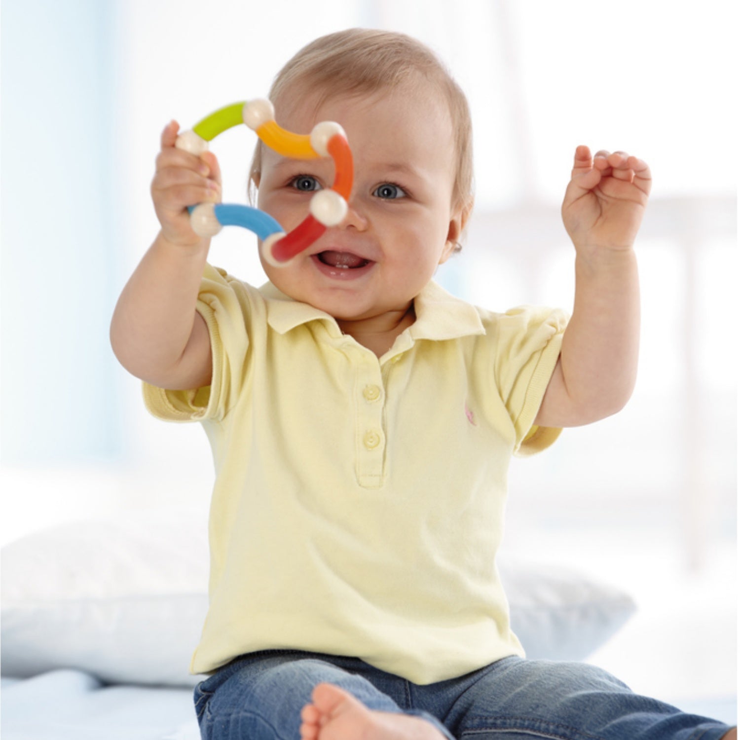 Trinity | Wooden Clutching Toy | HABA | Lifestyle: Baby with Clutching Toy in Hand | BeoVERDE.ie