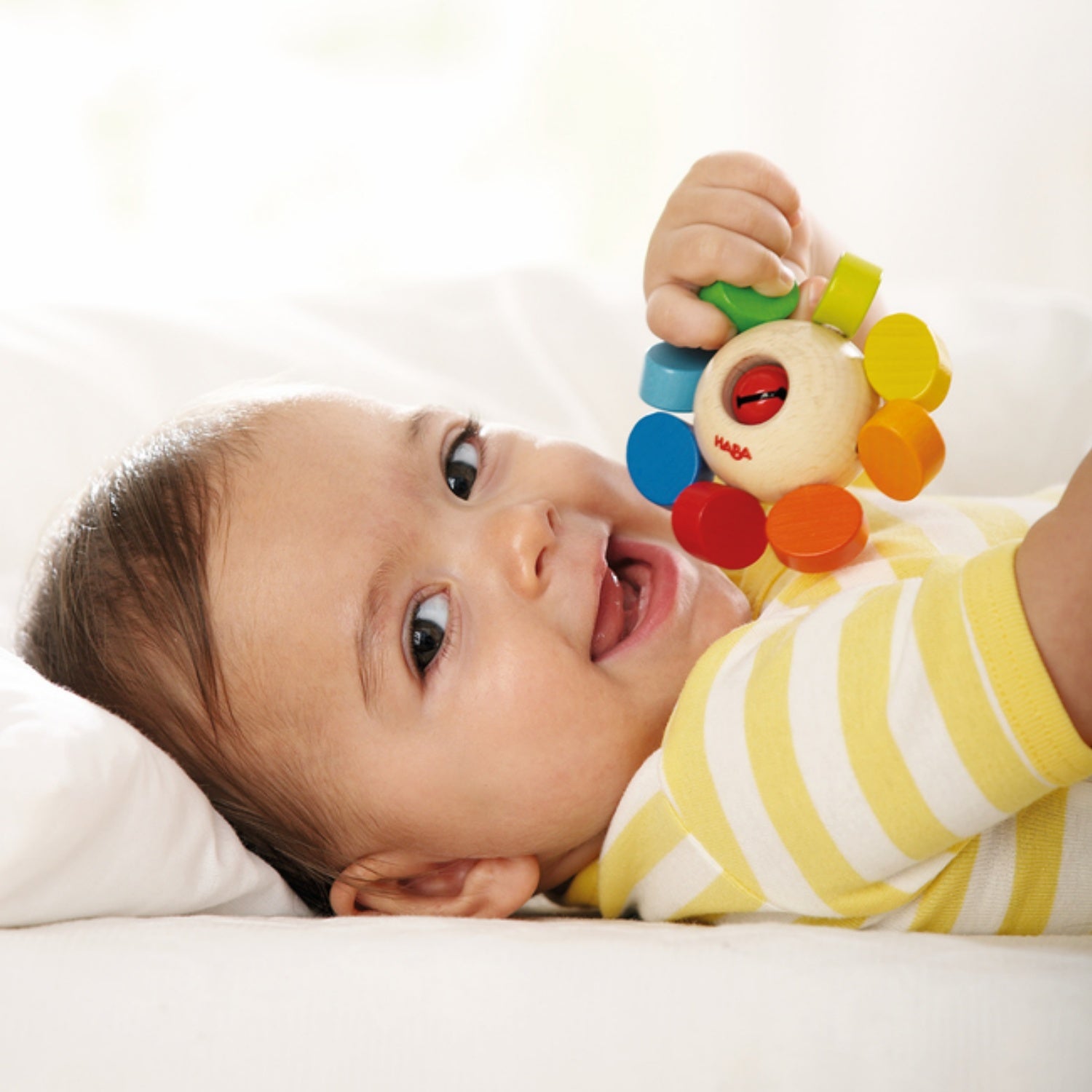 Whirlygig | Wooden Baby Clutching Toy | HABA | Lifestyle: Baby with Clutching Toy | BeoVERDE.ie
