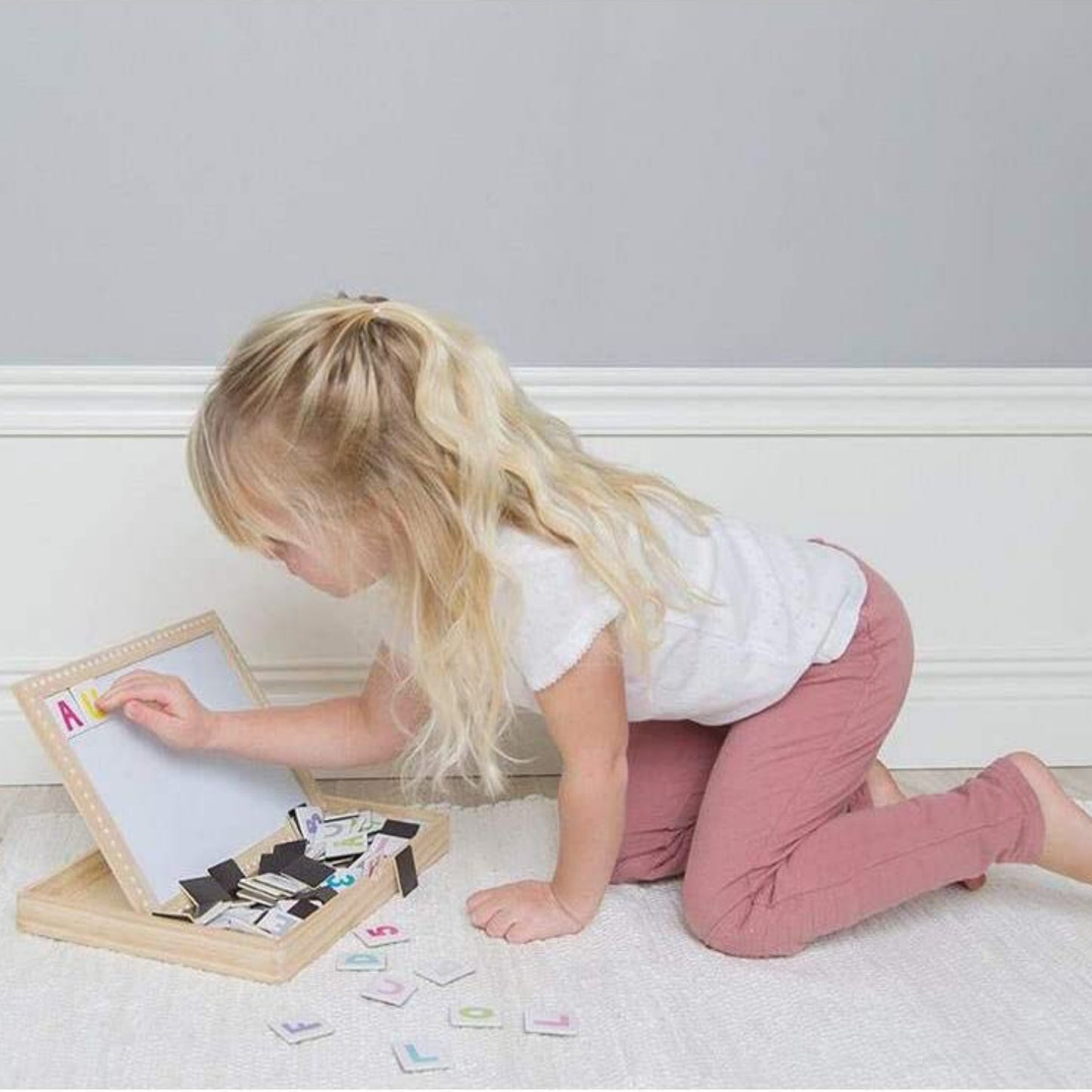 JaBaDaBaDo Magnetic Letters & Numbers Board | Wooden Educational Toy | Girl Playing | BeoVERDE.ie