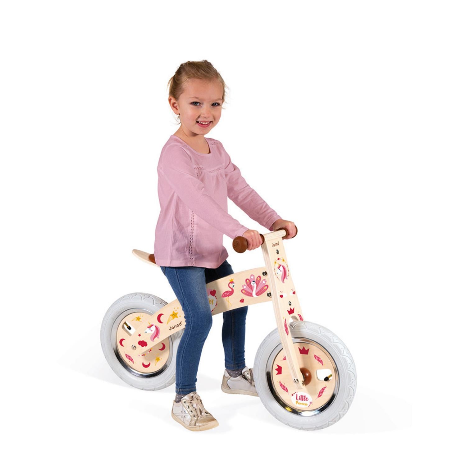 Janod Nature Balance Bike | Activity Wooden Toy| Bikes & Scooters | Lifestyle: Girl with Balance Bike at the Beach | BeoVERDE.ie