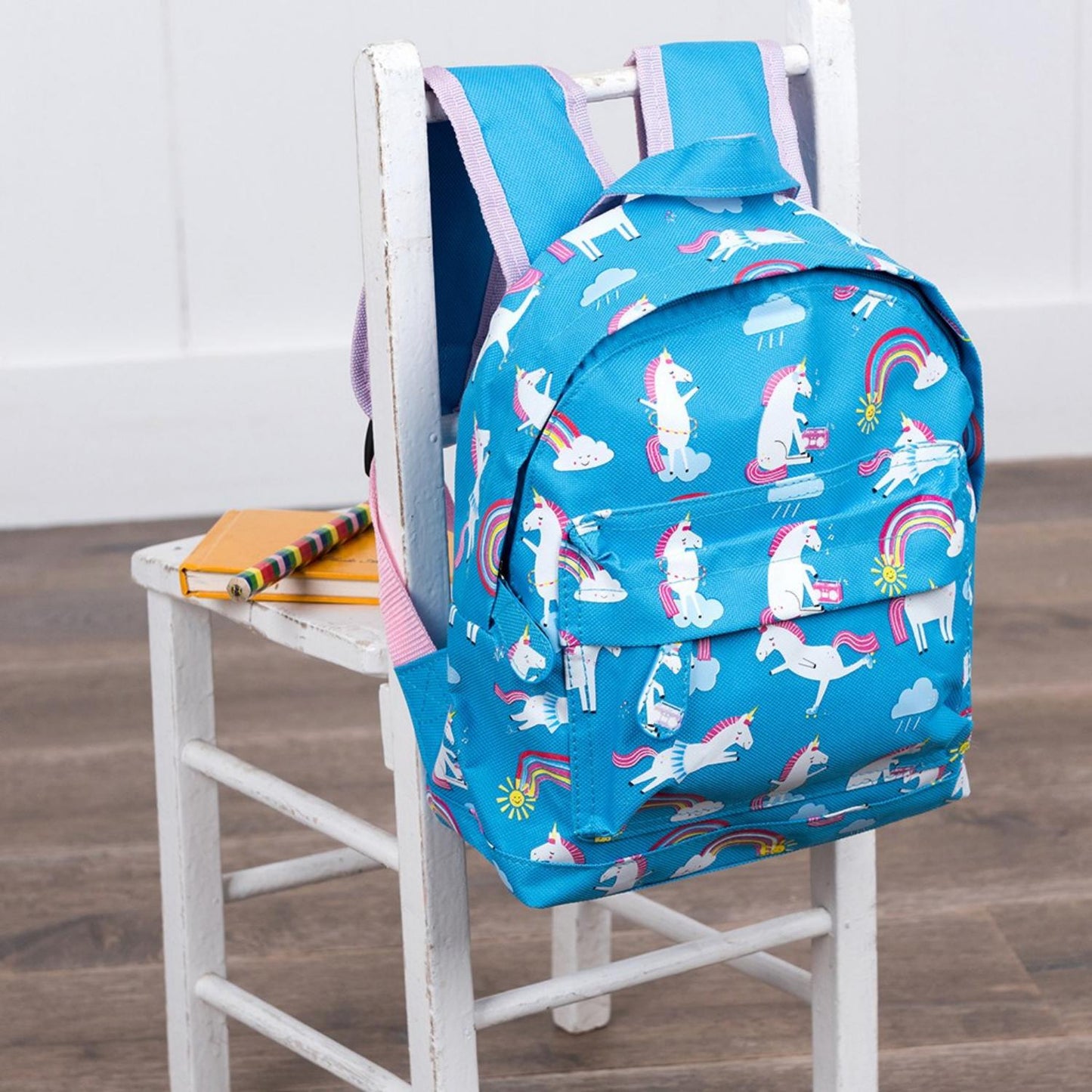Rex London Magical Unicorn Mini Backpack | Kid’s Backpack for Creche, Nursery & School | Lifestyle: Backpack on Chair | BeoVERDE.ie