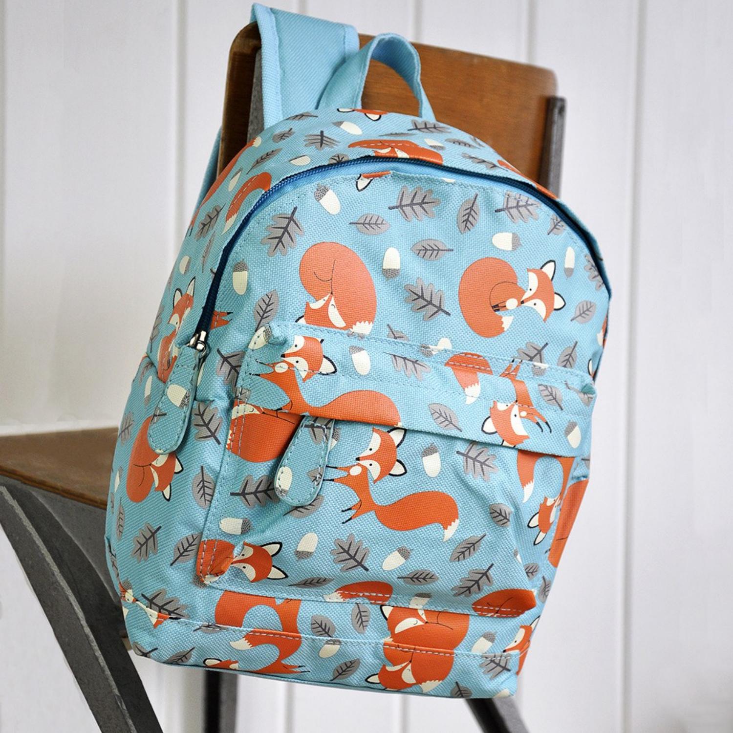 Rex London Rusty The Fox Mini Backpack | Kid’s Backpack for Creche, Nursery & School | Lifestyle: Backpack on Chair | BeoVERDE.ie