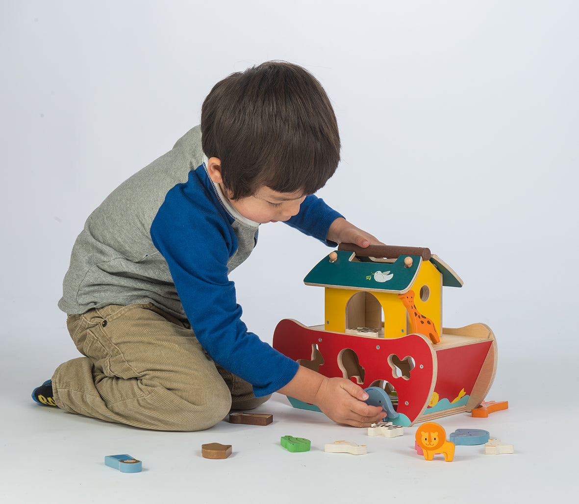 TenderLeaf Noah's Shape Sorter Ark Front Closed Set | Hand-Crafted Wooden Animal Toys | Boy Putting Through Animal | BeoVERDE.ie