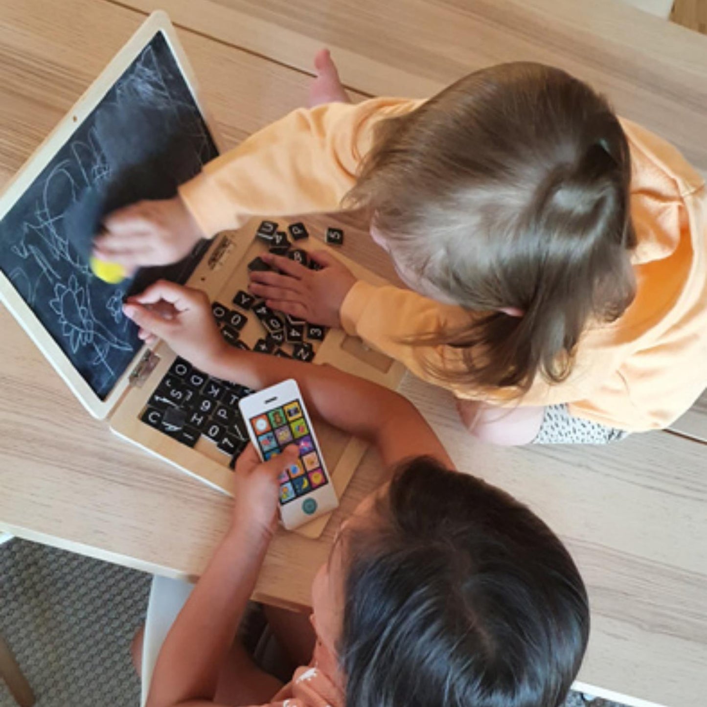 Small Foot 2-in-1 Magnetic Wooden Blackboard Laptop | Wooden Educational Toy | Lifestyle: Kids Drawing on Blackboard | BeoVERDE.ie