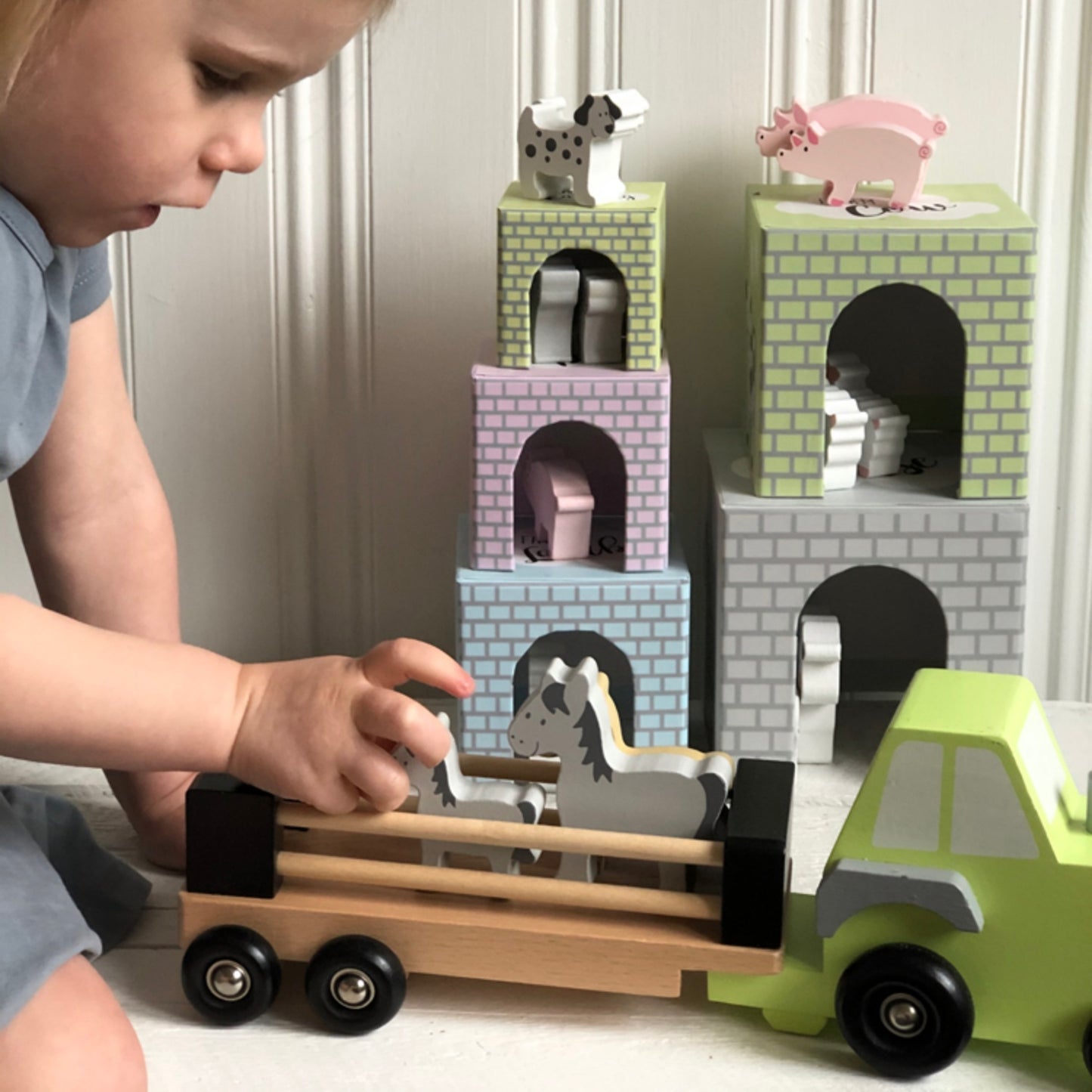 JaBaDaBaDo Farm Tractor | Wooden Imaginative Play Toy | Side View – Little Girl Playing | BeoVERDE.ie