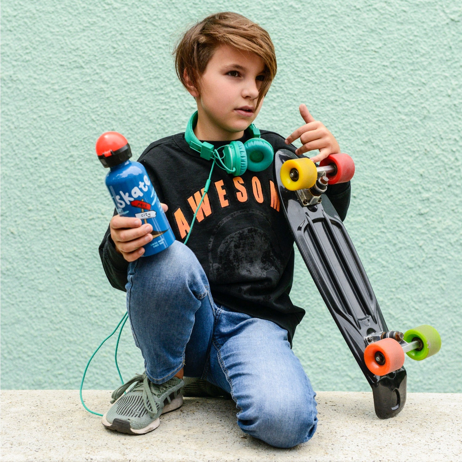 G Skater Kids Water Bottle | 400 ml | Lifestyle: Older Boy with Water Bottle | BeoVERDE Ireland