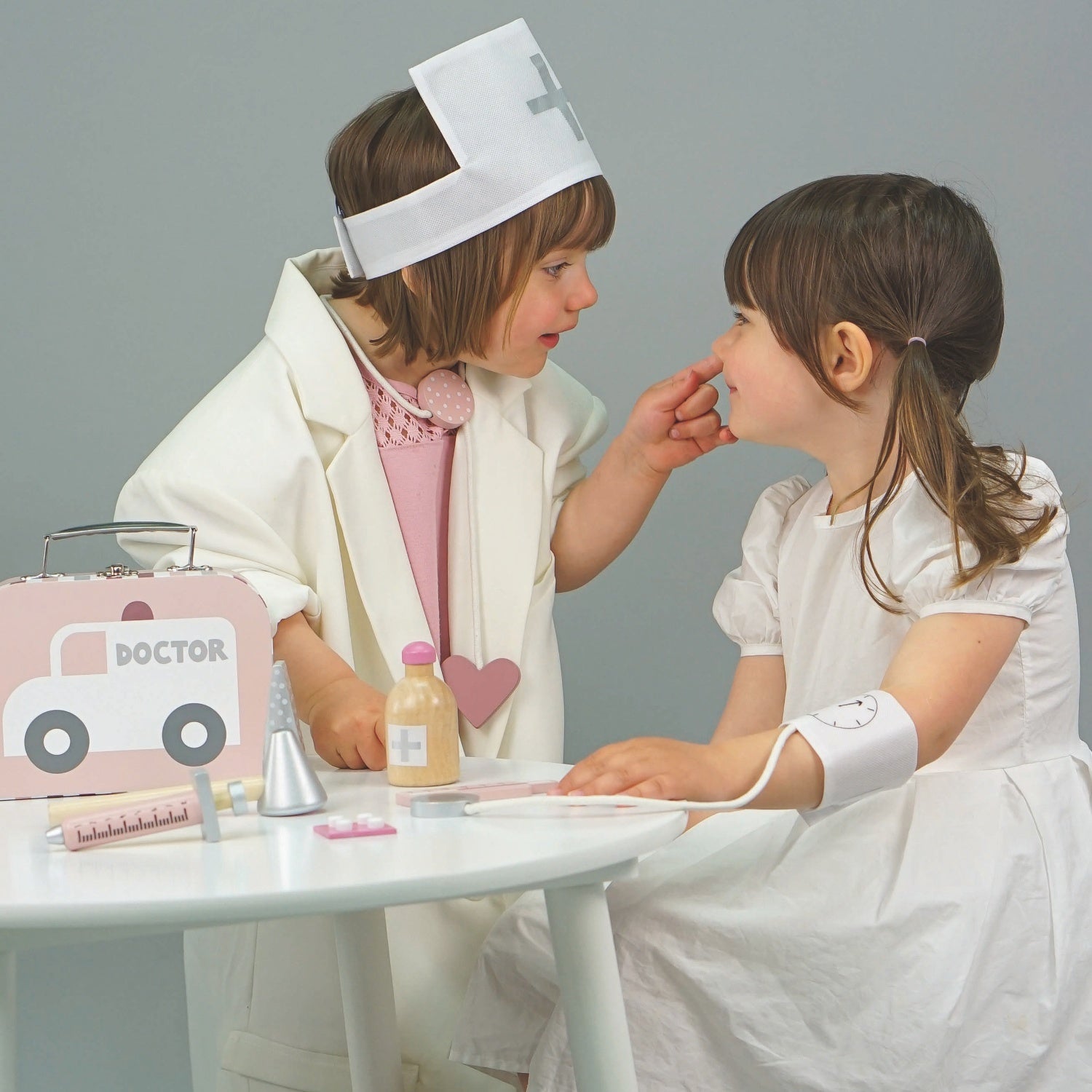 JaBaDaBaDo Doctor’s Case Pink | Wooden Pretend Play Toy | Lifestyle – 2 Girls Playing | BeoVERDE.ie