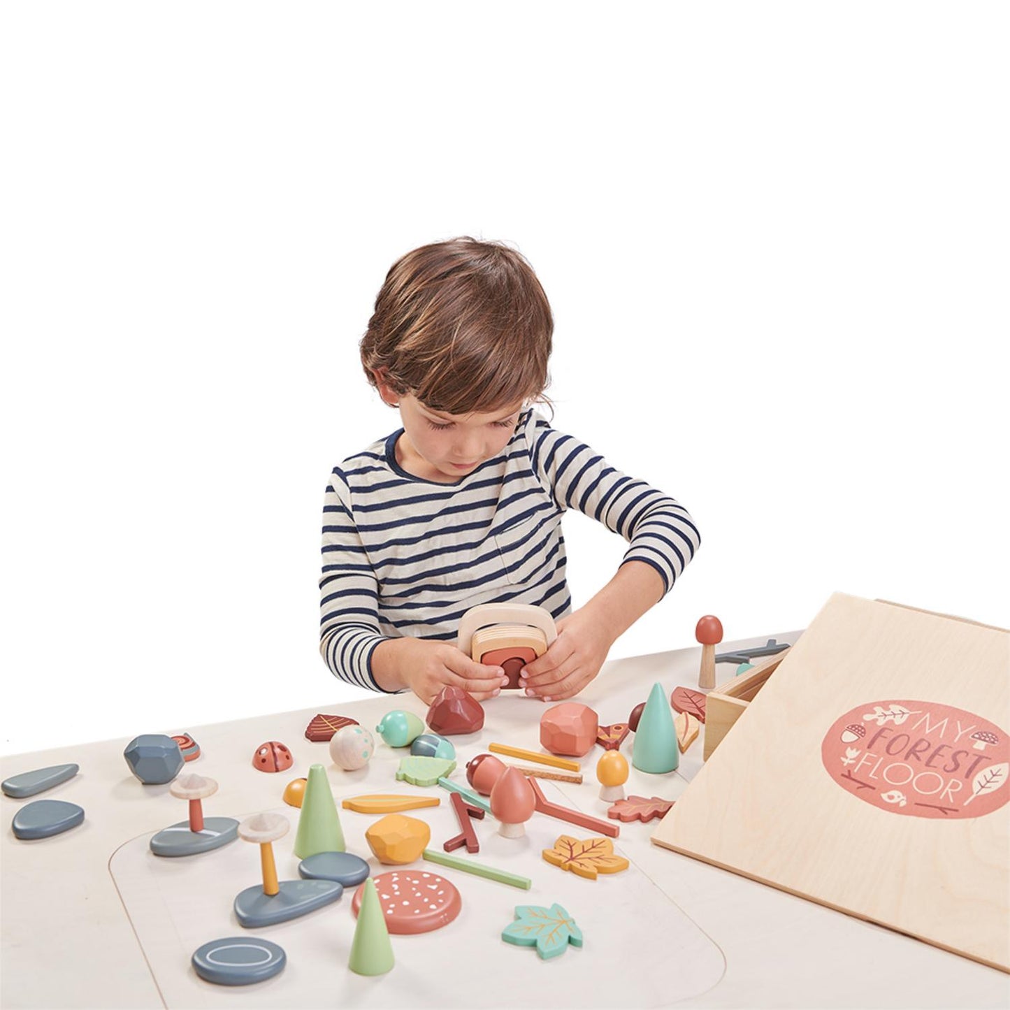 My Forest Floor | Open-Ended Play Wooden Toy Set For Kids | Lifestyle: Boy Playing With Wooden Pieces On A Table | BeoVERDE.ie