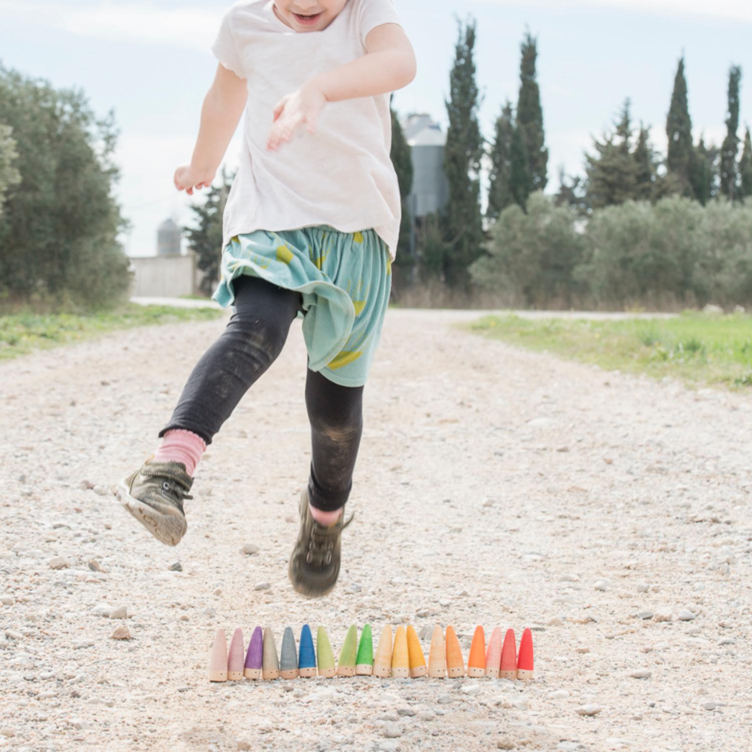 Grapat 18 Sticks | Wooden Toys | Open-Ended Play | Lifestyle: Girl Jumping | BeoVERDE.ie